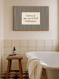 Black striped Text me if you run out of toilet paper poster above bathtub