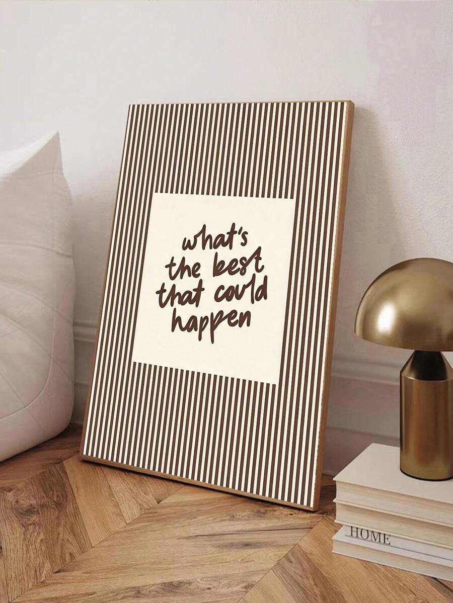 Brown striped Whats the best that could happen print near toilet and metallic lamp