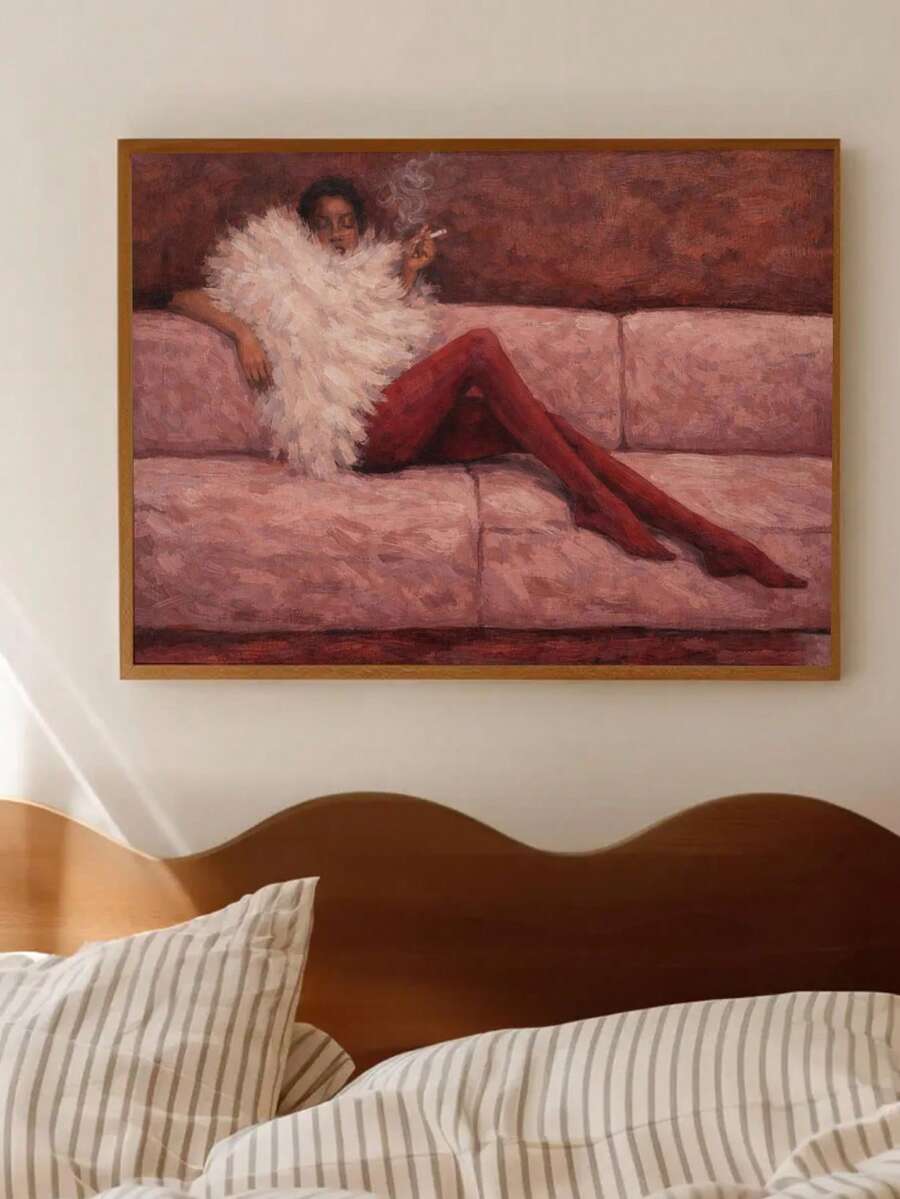 Woman in white feather top and red tights reclining on pink sofa in black-framed print