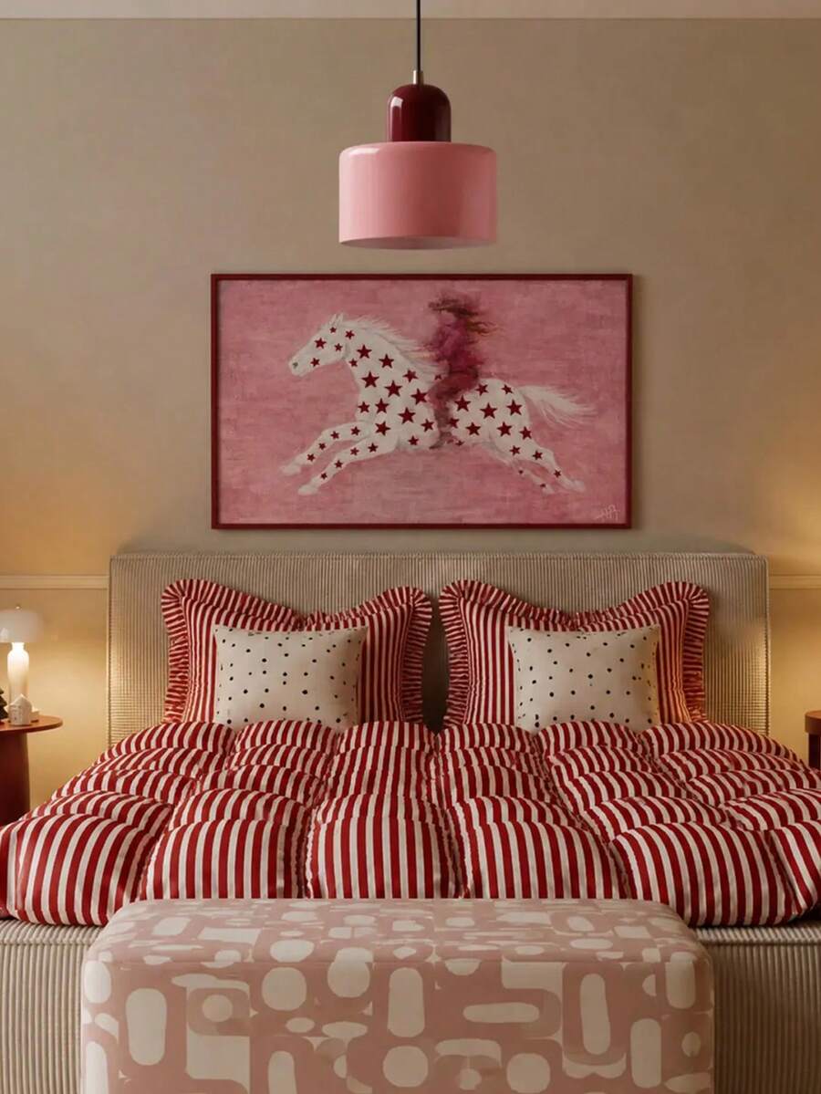 White horse with red stars and fashion rider poster above red-striped bed