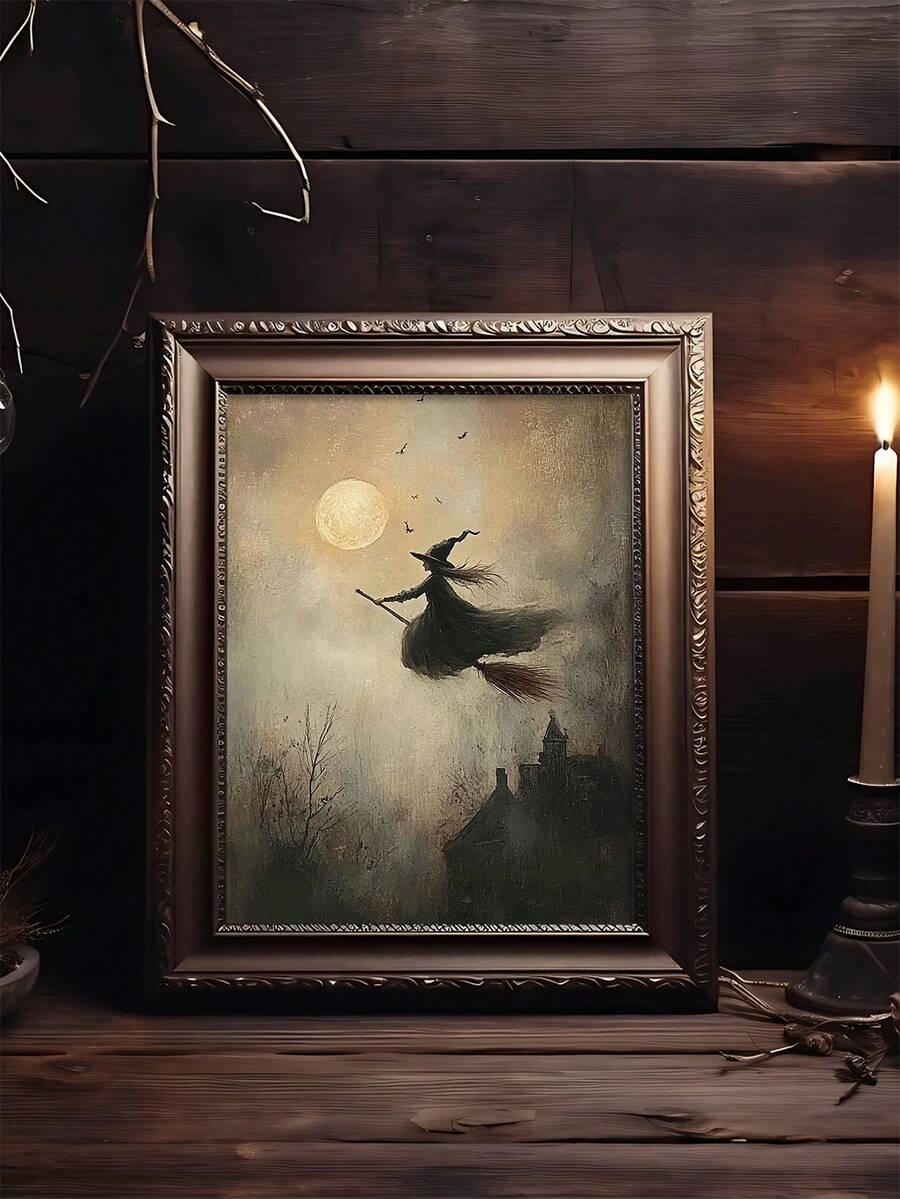 Vintage flying witch artwork leaning by taper candle