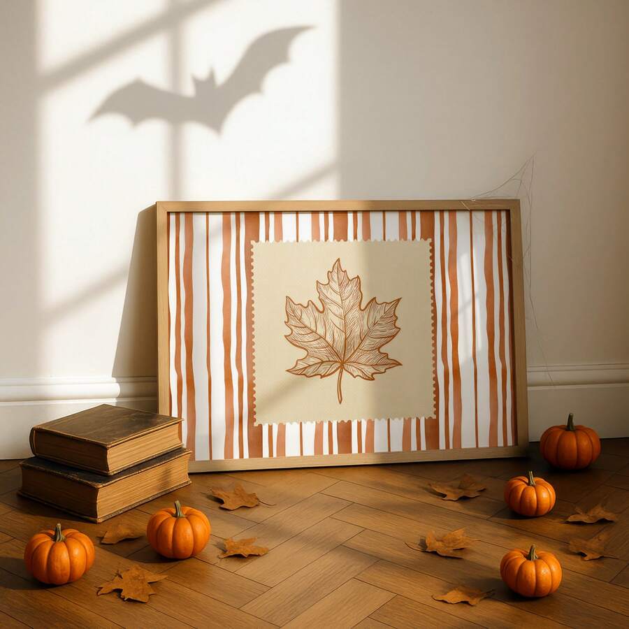 Autumn leaf wall art styled with pumpkins and vintage books