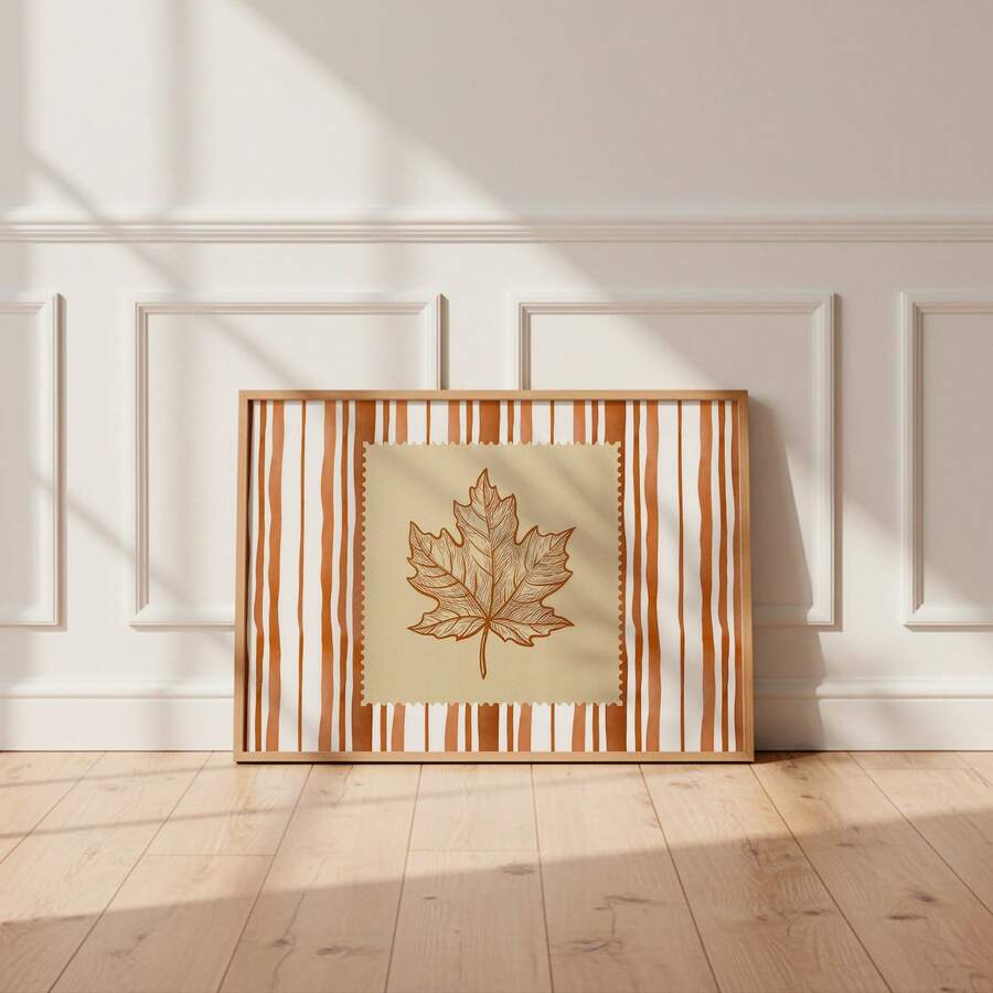 Neutral maple leaf canvas poster in bright paneled room