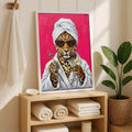 White framed pink leopard pop art with sunglasses robe cocktail and towels