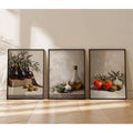 Tomato olive oil and eggplant triptych shown in dark frames