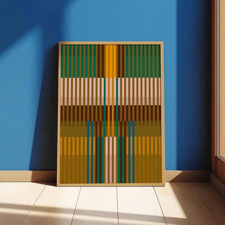Green and mustard striped abstract poster beside a beige sofa
