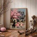 Pastel Halloween witch wall art beside a skeleton and pink autumn decorations