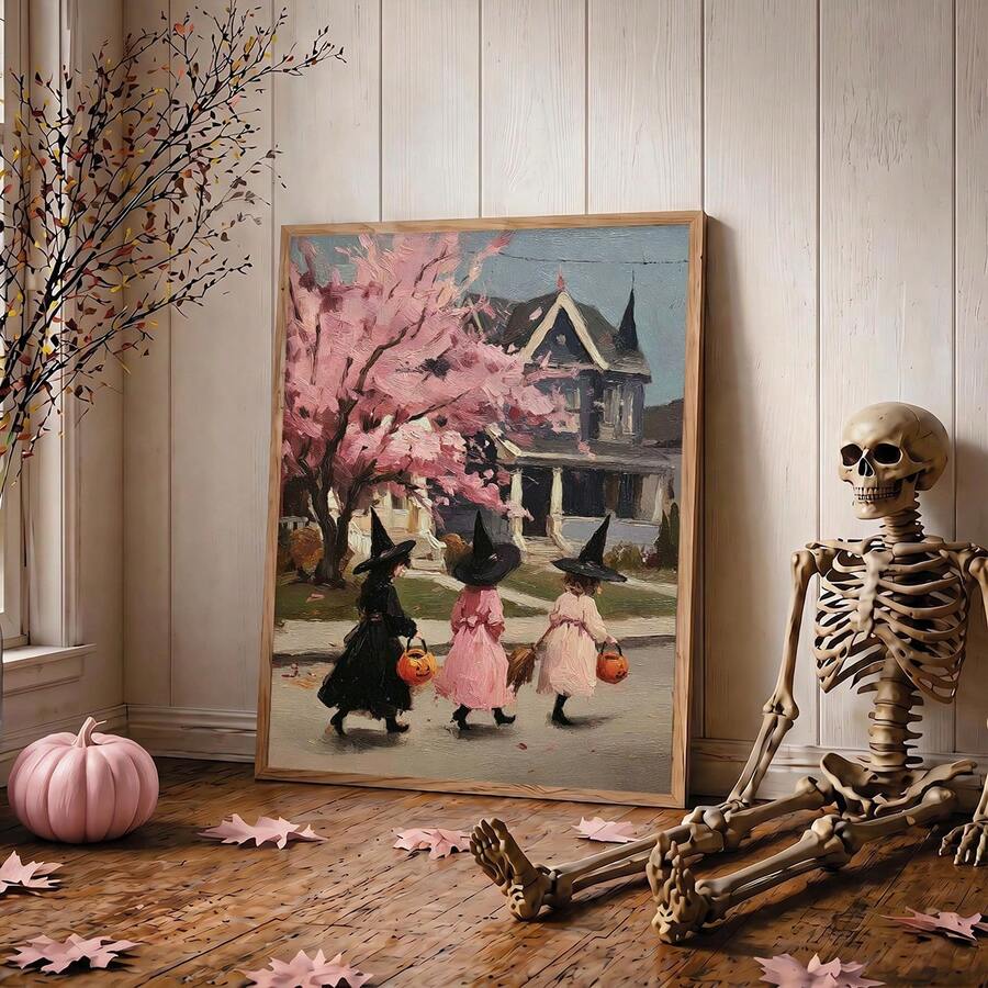 Pastel Halloween witch wall art beside a skeleton and pink autumn decorations