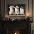 Black framed cowboy ghost artwork above a gothic fireplace with candles and skull decor