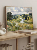River valley landscape in natural wood frame leaning on desk