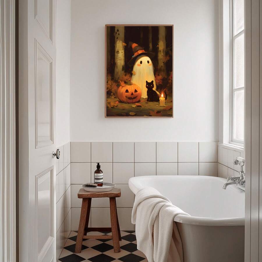 Ghost and jack-o-lantern poster displayed above a bright freestanding bathtub