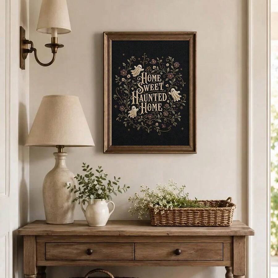 Haunted home botanical print above a rustic entry console with a lamp