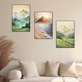 Black framed landscape poster set above a navy reading chair and wood side table