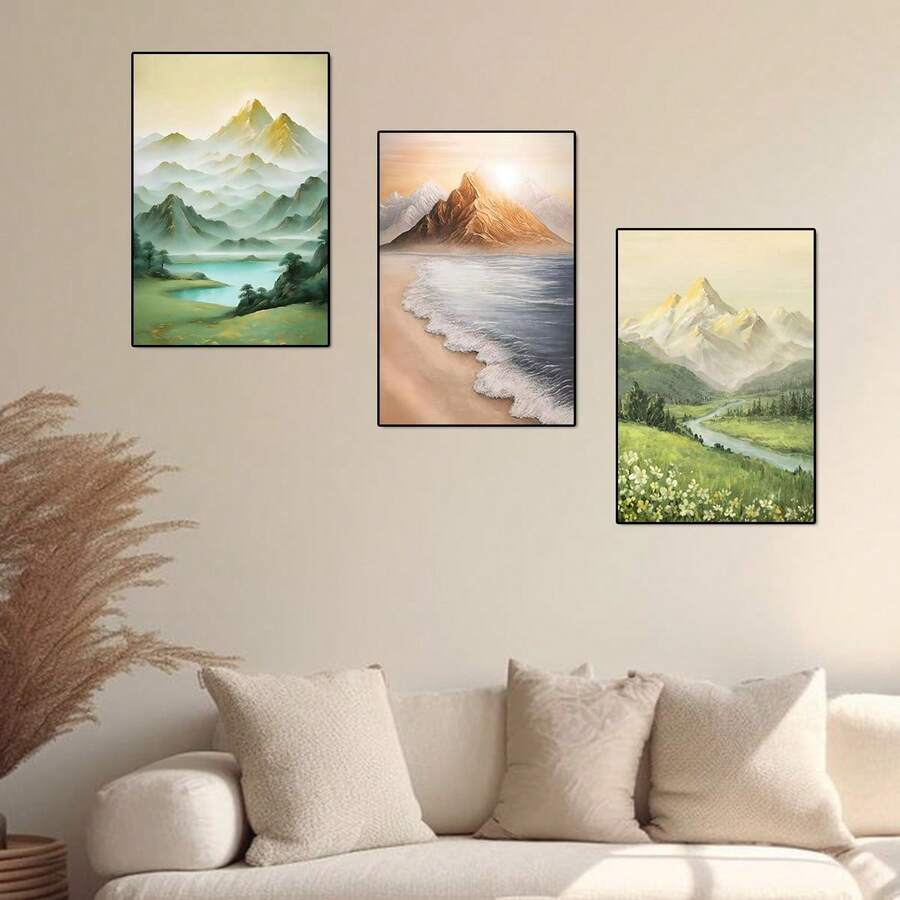 Black framed landscape poster set above a navy reading chair and wood side table