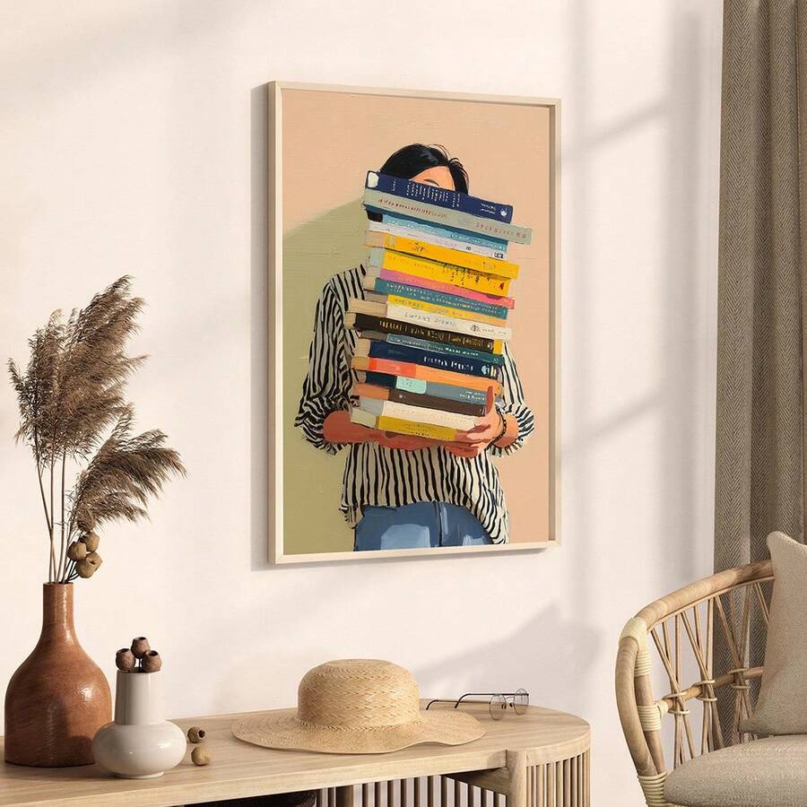 Reader wall art displayed above neutral console and woven chair