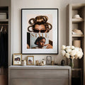 Black framed hair roller portrait styled above a dressing room dresser