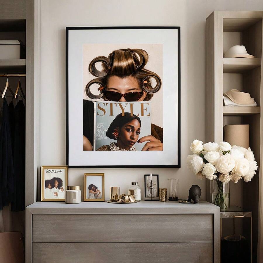 Black framed hair roller portrait styled above a dressing room dresser