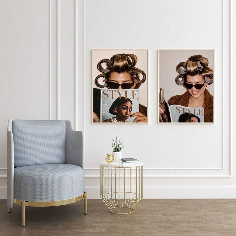 Two hair roller fashion prints beside a pale blue chair and gold accent table