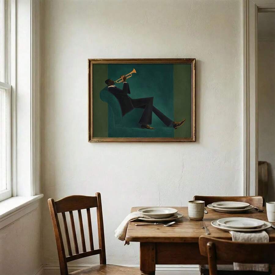 Ornate framed trumpet player artwork above a rustic dining table near a window