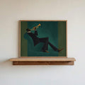 Light wood framed green jazz canvas print displayed on a minimal wall shelf