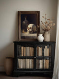 Old-master skull artwork with dramatic chiaroscuro lighting