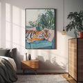 Black framed tiger canvas above a bedroom nightstand with leafy plants
