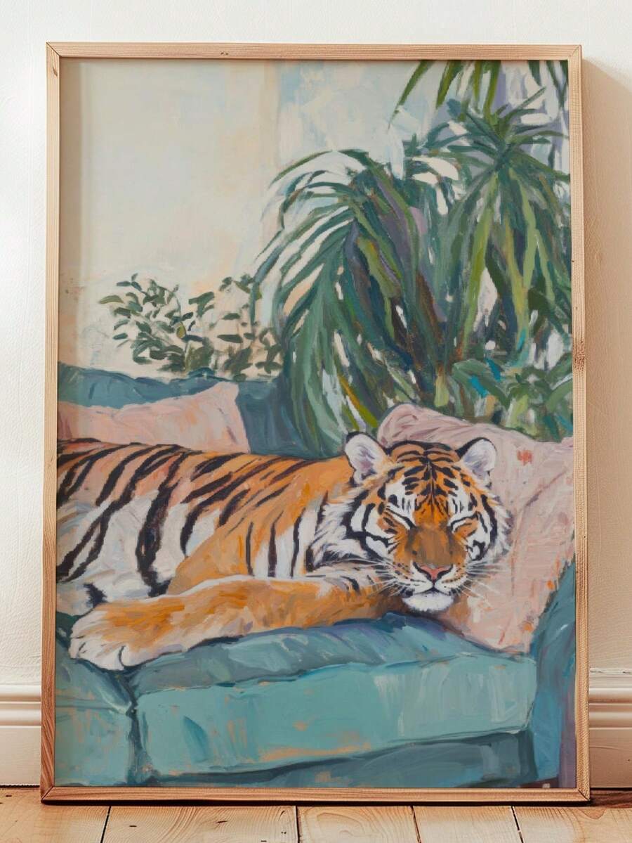 Black framed tiger painting on a white wall with teal sofa and tropical plants