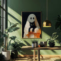 Gold-framed ghost and black cat artwork over a console amid tropical plants