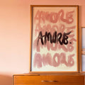 Amore typography canvas styled beside eclectic chair and bar cart