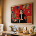 Matisse-style portrait canvas displayed over a desk and candles