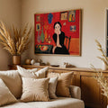 Bold red portrait canvas above a neutral living room sofa