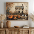 Oversized haunted farmhouse canvas with jack-o-lanterns above a natural wood sideboard