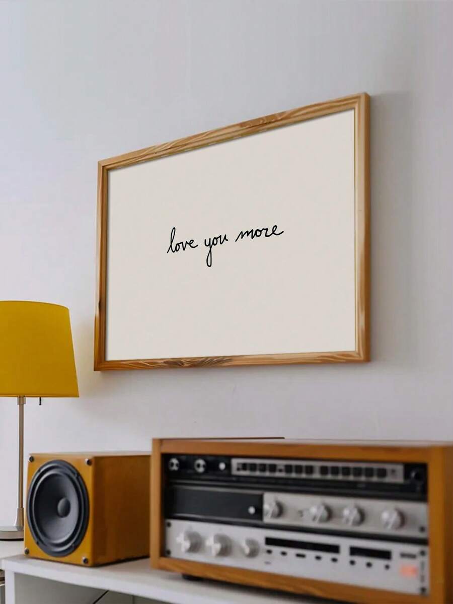 Love you more wall art above vintage stereo and mustard floor lamp