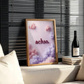 Add a soft, expressive accent to your home with this bohemian canvas poster featuring the playful “achso.” lettering set against dreamy pink-lilac clouds. Its whimsical contemporary design brings a gentle focal point to a room without feeling loud or overworked.