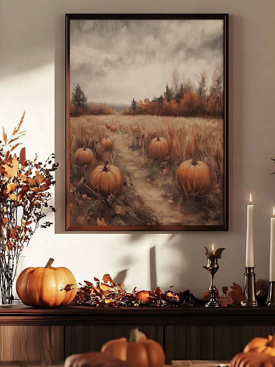 Seasonal pumpkin landscape artwork above a console