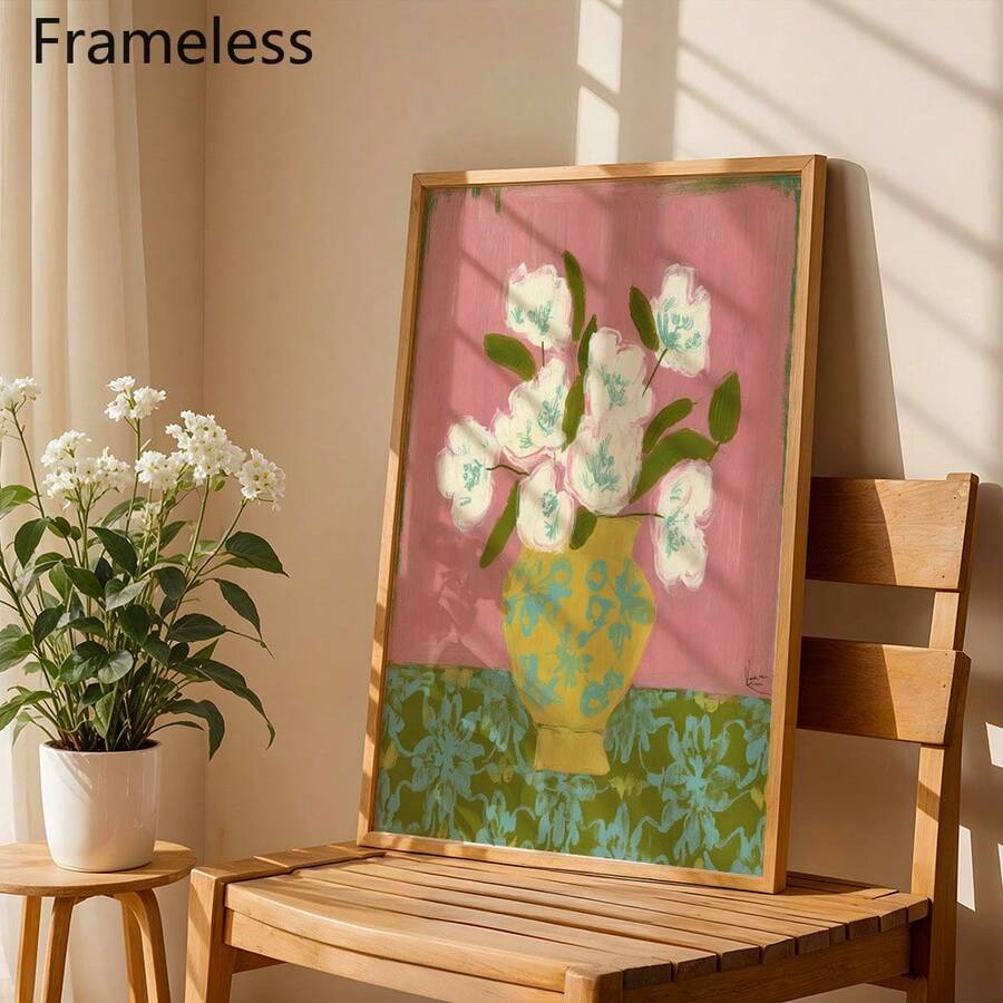 Pink and teal blossom canvas on wood chair beside potted white flowers