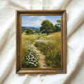 Ornate antique gold framed countryside daisy canvas displayed on white fabric