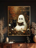 Reading ghost and black cat autumn canvas poster displayed in a thin gold portrait frame
