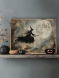 Moonlit flying witch canvas art displayed on a shelf with pumpkins