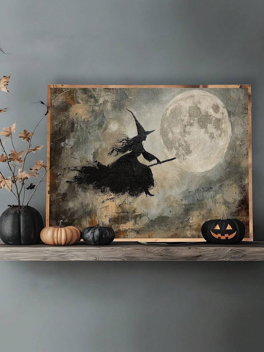 Moonlit flying witch canvas art displayed on a shelf with pumpkins