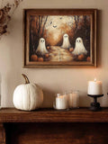 Three playful ghosts in an autumn forest shown in a rustic wood frame