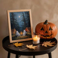 Framed ghost forest painting styled with pumpkins and lanterns