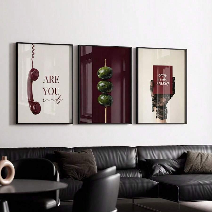 Green olive skewer poster in a slim black frame above a black leather sofa