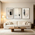 Black beige geometric abstract triptych in a living room mockup