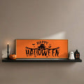 Orange Happy Halloween scarecrow art on a floating shelf with pumpkin and ghost decor