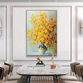 Golden yellow bouquet canvas print styled above a dining table