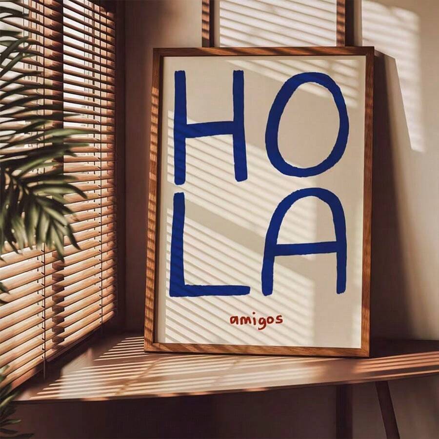 Hand-painted navy HOLA lettering with red amigos text