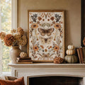 Dark pastoral moth artwork styled on an autumn fireplace mantel