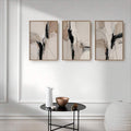 Minimalist neutral artwork styled above a modern console