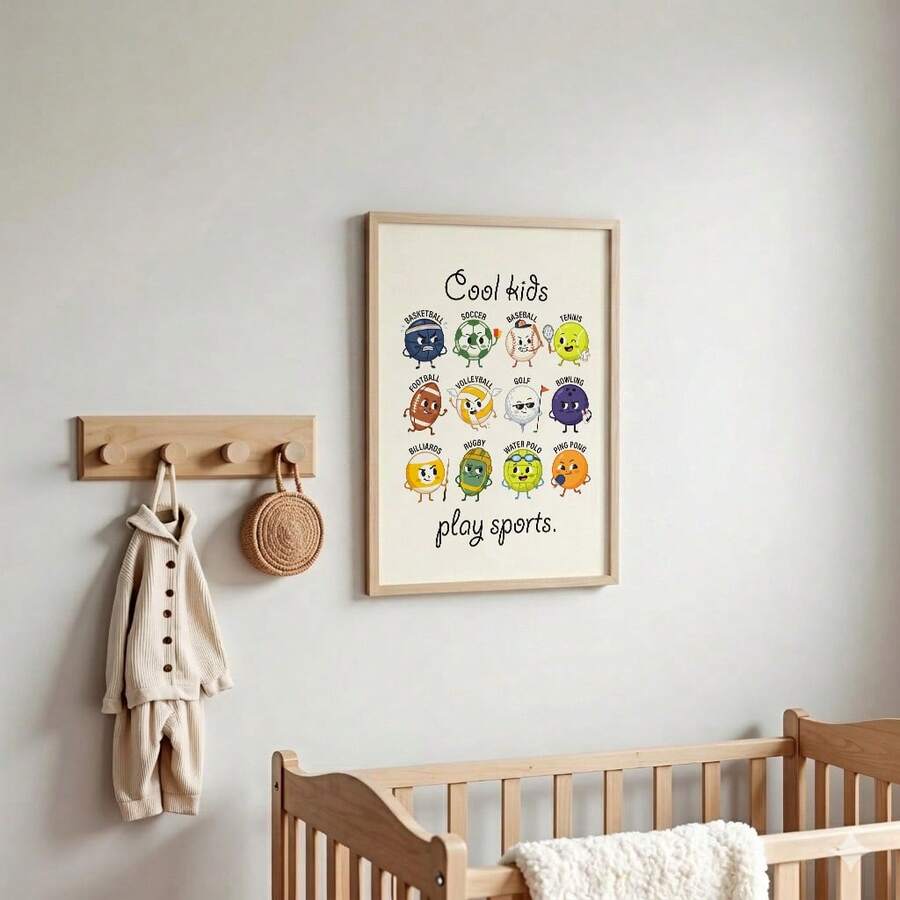 Cartoon sports ball poster displayed above a child’s crib in wood-accented room